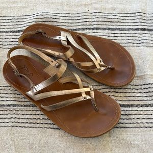 Olukai metallic gold sandal
